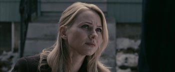 Movie still from “Fair Game” (2010), directed by Doug Liman – A person with blond hair; Close Up shot, Over the shoulder angle