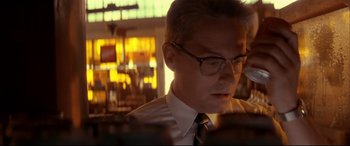 Movie still from “Falling Down” (1993), directed by Joel Schumacher – A person wearing glasses and a tie; Close Up shot, Low angle