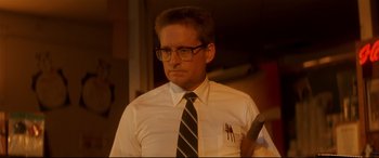 Movie still from “Falling Down” (1993), directed by Joel Schumacher – A man in a white dress shirt and a tie; Close Up shot, Low angle