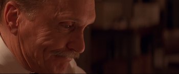 Movie still from “Falling Down” (1993), directed by Joel Schumacher – An older man with a mustache and a goatee; Close Up shot, Low angle