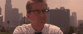 Movie still from “Falling Down” (1993), directed by Joel Schumacher – A person wearing a shirt and tie; Close Up shot, Low angle