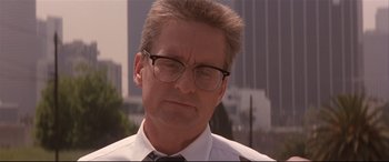 Movie still from “Falling Down” (1993), directed by Joel Schumacher – A person wearing glasses and a tie; Close Up shot, Low angle