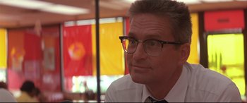 Movie still from “Falling Down” (1993), directed by Joel Schumacher – A person wearing a shirt and tie; Close Up shot, Low angle