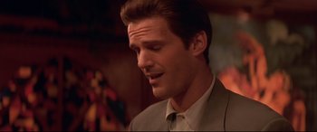 Movie still from “Falling Down” (1993), directed by Joel Schumacher – A person wearing a suit and tie; Close Up shot, Low angle