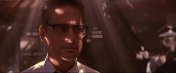 Movie still from “Falling Down” (1993), directed by Joel Schumacher – A person wearing glasses; Close Up shot, Low angle