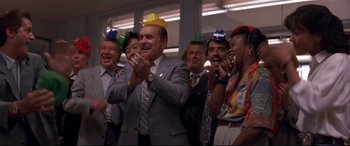 Movie still from “Falling Down” (1993), directed by Joel Schumacher – A group of people wearing party hats and applauding; Medium shot, Low angle