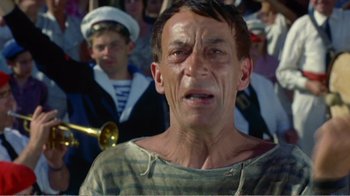 Movie still from “Fanny” (1961), directed by Joshua Logan – An old man is crying in front of a crowd; Close Up shot, Low angle