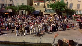 Movie still from “Fanny” (1961), directed by Joshua Logan – A crowd of people gathered on the side of the street; Extreme Wide shot, High angle