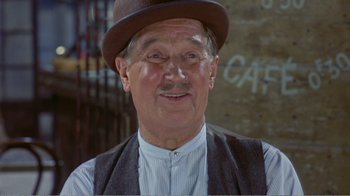 Movie still from “Fanny” (1961), directed by Joshua Logan – An older man wearing a hat and a vest; Close Up shot, High angle