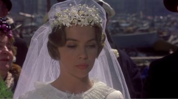 Movie still from “Fanny” (1961), directed by Joshua Logan – A woman wearing a veil and a flower crown; Close Up shot, High angle