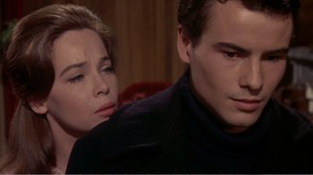 Movie still from “Fanny” (1961), directed by Joshua Logan – A man and a woman sitting next to each other; Close Up shot, Over the shoulder angle