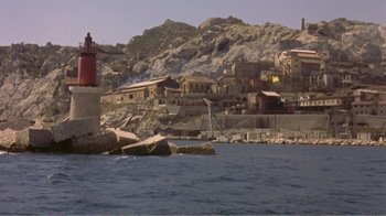 Movie still from “Fanny” (1961), directed by Joshua Logan – A view of a town from the water; Extreme Wide shot, High angle