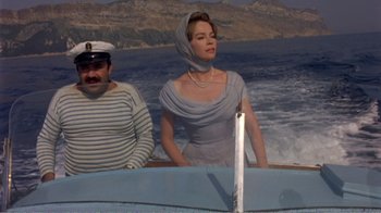 Movie still from “Fanny” (1961), directed by Joshua Logan – A man and a woman on a boat in the ocean; Medium shot, Low angle