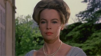 Movie still from “Fanny” (1961), directed by Joshua Logan – A person wearing a necklace; Close Up shot, Low angle
