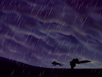 Movie still from “Fantasia” (1940), directed by Ford Beebe Jr. – A couple of animals that are standing in the rain; Extreme Wide shot, Low angle