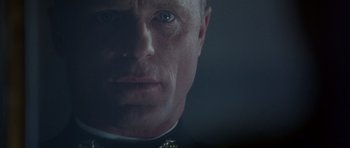 Movie still from “The Rock” (1996), directed by Michael Bay – A man's face in a military uniform; Close Up shot, Low angle