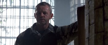 Movie still from “The Rock” (1996), directed by Michael Bay – A person with a hand up; Close Up shot, Low angle