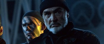 Movie still from “The Rock” (1996), directed by Michael Bay – An older man with a beard; Close Up shot, Low angle