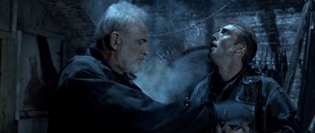 Movie still from “The Rock” (1996), directed by Michael Bay – An older man and a younger man are fighting; Close Up shot, Over the shoulder angle