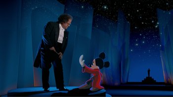 Movie still from “Fantasia 2000” (1999), directed by Eric Goldberg – An animated scene of a man and a child mickey mouse; Wide shot, Low angle