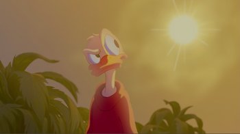 Movie still from “Fantasia 2000” (1999), directed by Eric Goldberg – A cartoon character with a sun in the background; Close Up shot, Low angle