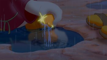 Movie still from “Fantasia 2000” (1999), directed by Eric Goldberg – A person is pouring water into a puddle; Medium shot, High angle