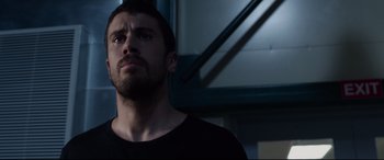 Movie still from “Fantastic Four” (2015), directed by Josh Trank – A person with a black shirt; Close Up shot, Low angle