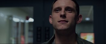 Movie still from “Fantastic Four” (2015), directed by Josh Trank – A man's face in a dark room; Close Up shot, Low angle