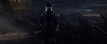 Movie still from “Fantastic Four” (2015), directed by Josh Trank – A man wearing a gas mask in the middle of the night; Wide shot, Low angle