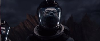 Movie still from “Fantastic Four” (2015), directed by Josh Trank – A person wearing a helmet and goggles; Close Up shot, Overhead angle