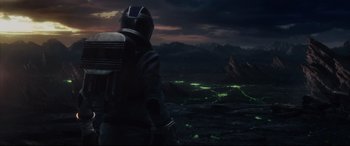 Movie still from “Fantastic Four” (2015), directed by Josh Trank – A man standing in the middle of a field; Wide shot, High angle
