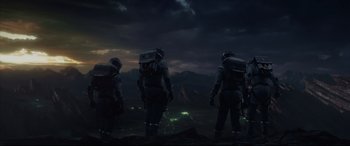 Movie still from “Fantastic Four” (2015), directed by Josh Trank – A group of people standing on top of a hill; Extreme Wide shot, High angle