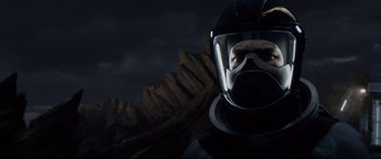 Movie still from “Fantastic Four” (2015), directed by Josh Trank – A person wearing a helmet and goggles in the dark; Close Up shot, Low angle