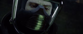 Movie still from “Fantastic Four” (2015), directed by Josh Trank – A person wearing a gas mask; Close Up shot, Low angle