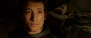 Movie still from “Fantastic Four” (2015), directed by Josh Trank – A man's face in the dark; Close Up shot, High angle