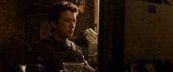 Movie still from “Fantastic Four” (2015), directed by Josh Trank – A man in a leather jacket sitting in front of a computer; Close Up shot, Over the shoulder angle