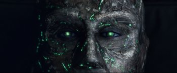 Movie still from “Fantastic Four” (2015), directed by Josh Trank – The eyes of a person with green eyes; Extreme Close Up shot, Low angle