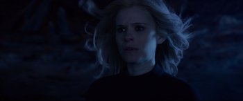 Movie still from “Fantastic Four” (2015), directed by Josh Trank – A woman with long blonde hair in the dark; Close Up shot, Low angle