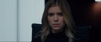 Movie still from “Fantastic Four” (2015), directed by Josh Trank – A person sitting in a chair; Close Up shot, Over the shoulder angle
