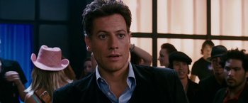 Movie still from “Fantastic Four: Rise of the Silver Surfer” (2007), directed by Tim Story – A person wearing a suit and tie; Close Up shot, Over the shoulder angle