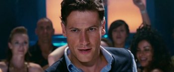 Movie still from “Fantastic Four: Rise of the Silver Surfer” (2007), directed by Tim Story – A person wearing a suit and tie; Close Up shot, Low angle