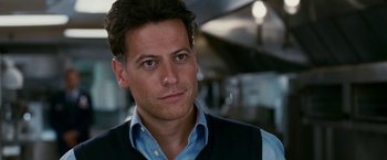 Movie still from “Fantastic Four: Rise of the Silver Surfer” (2007), directed by Tim Story – A person wearing a shirt and vest; Close Up shot, Over the shoulder angle