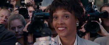 Movie still from “Fantastic Four: Rise of the Silver Surfer” (2007), directed by Tim Story – A person holding a camera; Close Up shot, Low angle