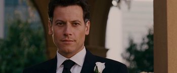 Movie still from “Fantastic Four: Rise of the Silver Surfer” (2007), directed by Tim Story – A person wearing a suit and tie; Close Up shot, Low angle