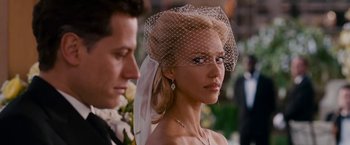 Movie still from “Fantastic Four: Rise of the Silver Surfer” (2007), directed by Tim Story – A woman in a veil and a man in a suit; Close Up shot, Over the shoulder angle