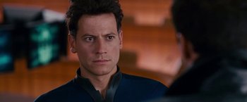 Movie still from “Fantastic Four: Rise of the Silver Surfer” (2007), directed by Tim Story – A person wearing a suit and tie; Close Up shot, Over the shoulder angle
