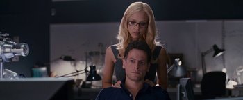 Movie still from “Fantastic Four: Rise of the Silver Surfer” (2007), directed by Tim Story – A man and a woman pose for a picture; Medium shot, Over the shoulder angle