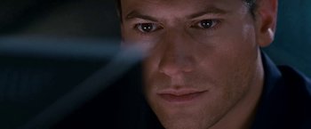 Movie still from “Fantastic Four: Rise of the Silver Surfer” (2007), directed by Tim Story – A man's face in the dark; Extreme Close Up shot, Low angle