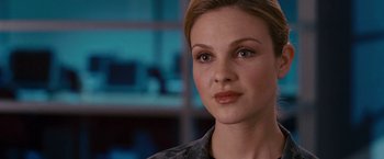 Movie still from “Fantastic Four: Rise of the Silver Surfer” (2007), directed by Tim Story – A person wearing a black shirt; Close Up shot, Over the shoulder angle