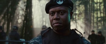 Movie still from “Fantastic Four: Rise of the Silver Surfer” (2007), directed by Tim Story – A man in a military uniform wearing a hat; Close Up shot, Low angle